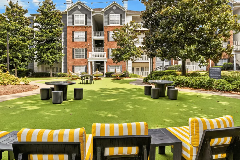 Oaks at Sugarloaf Apartments - Outdoor Chairs, Tables, and Hammocks
