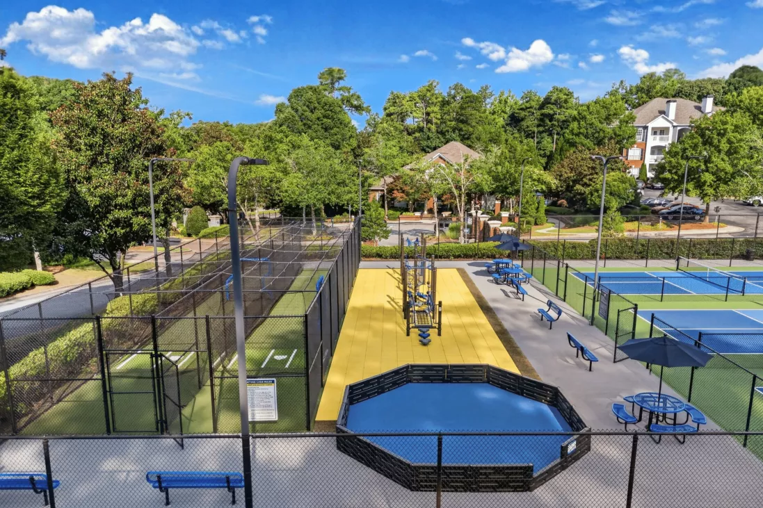 Oaks at Sugarloaf Apartments - Outdoor Batting Cages and Gym.png